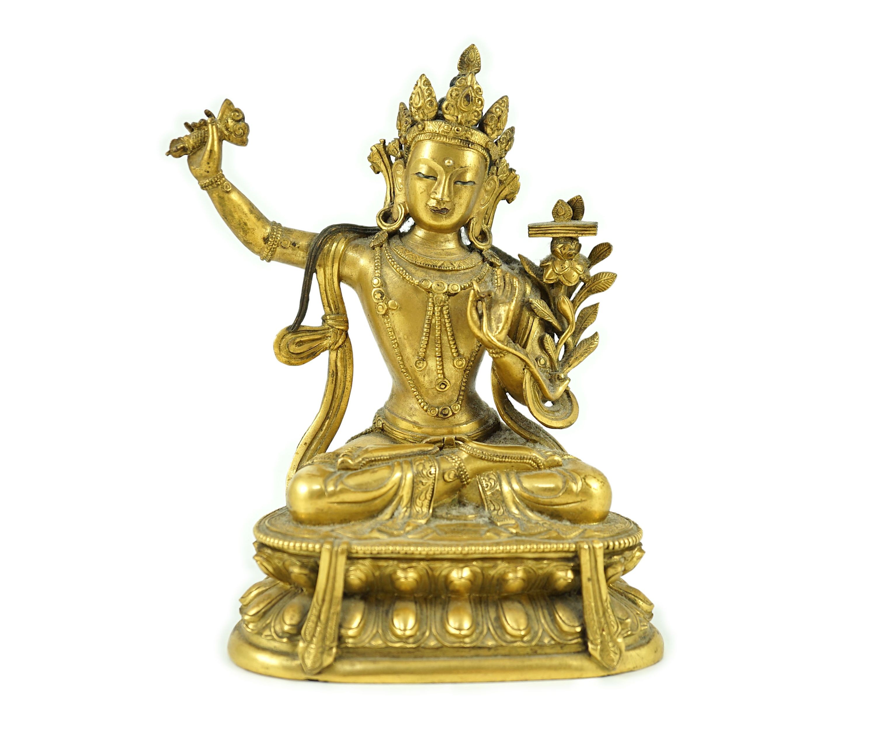 A Tibetan gilt bronze seated figure of Vajrasattva, 16.5 cm high